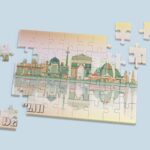 Jigsaw puzzle of a colorful abstract skyline of delhi featuring iconic monuments