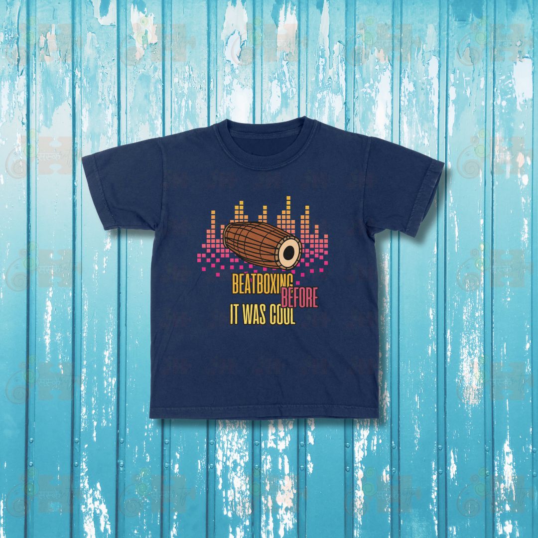 Navy t-shirt with a vintage-style illustration of a Mridangam drum and the text "Beatboxing Before It Was Cool"